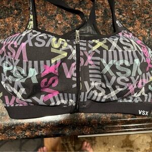 Victoria’s Secret black Zip-Front Sports Bra with Pink, Mint, Yellow and Gray